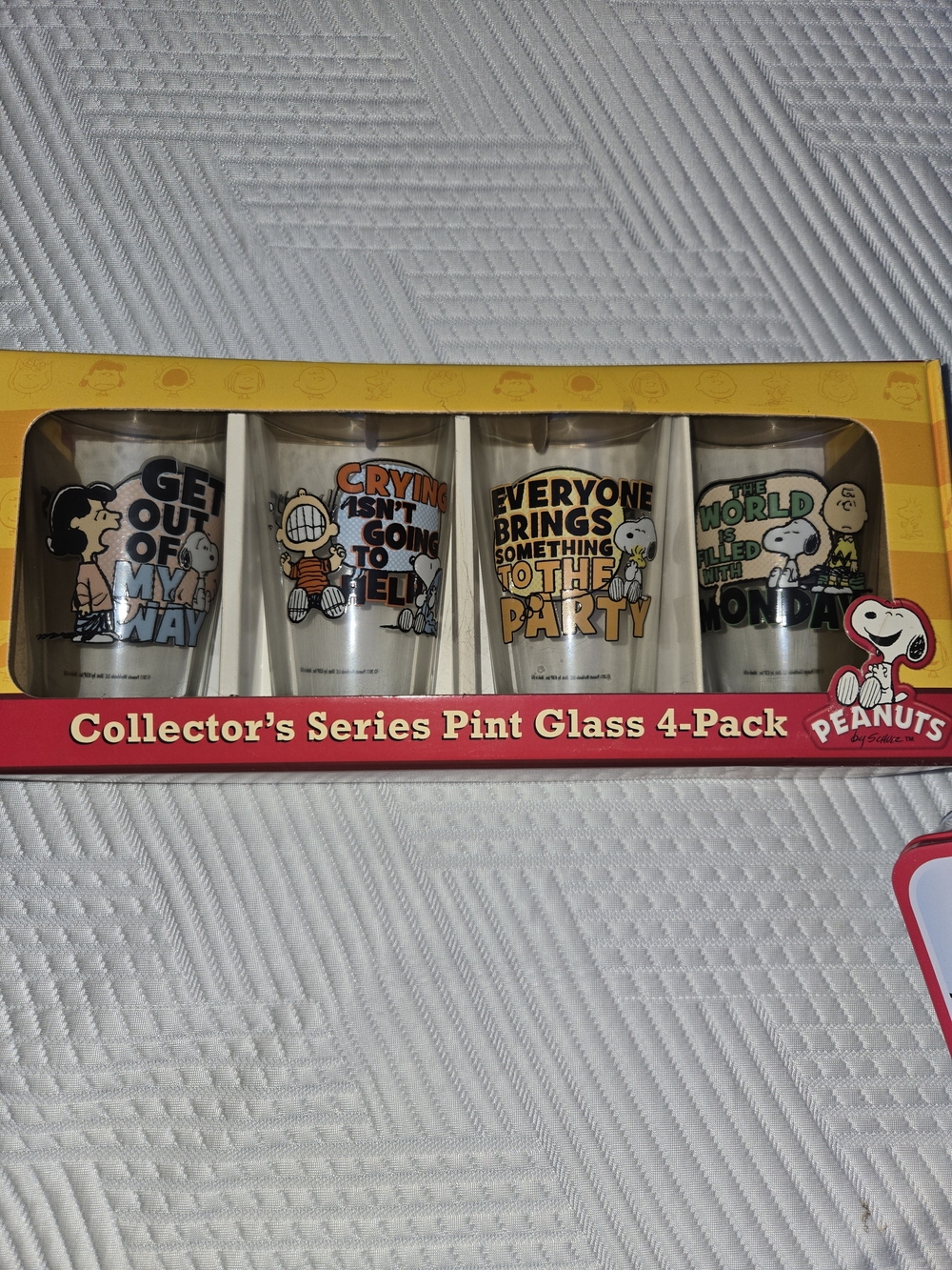 Peanuts Pint Glass 4-Pack — Yellow, Black, Orange, Green Graphics